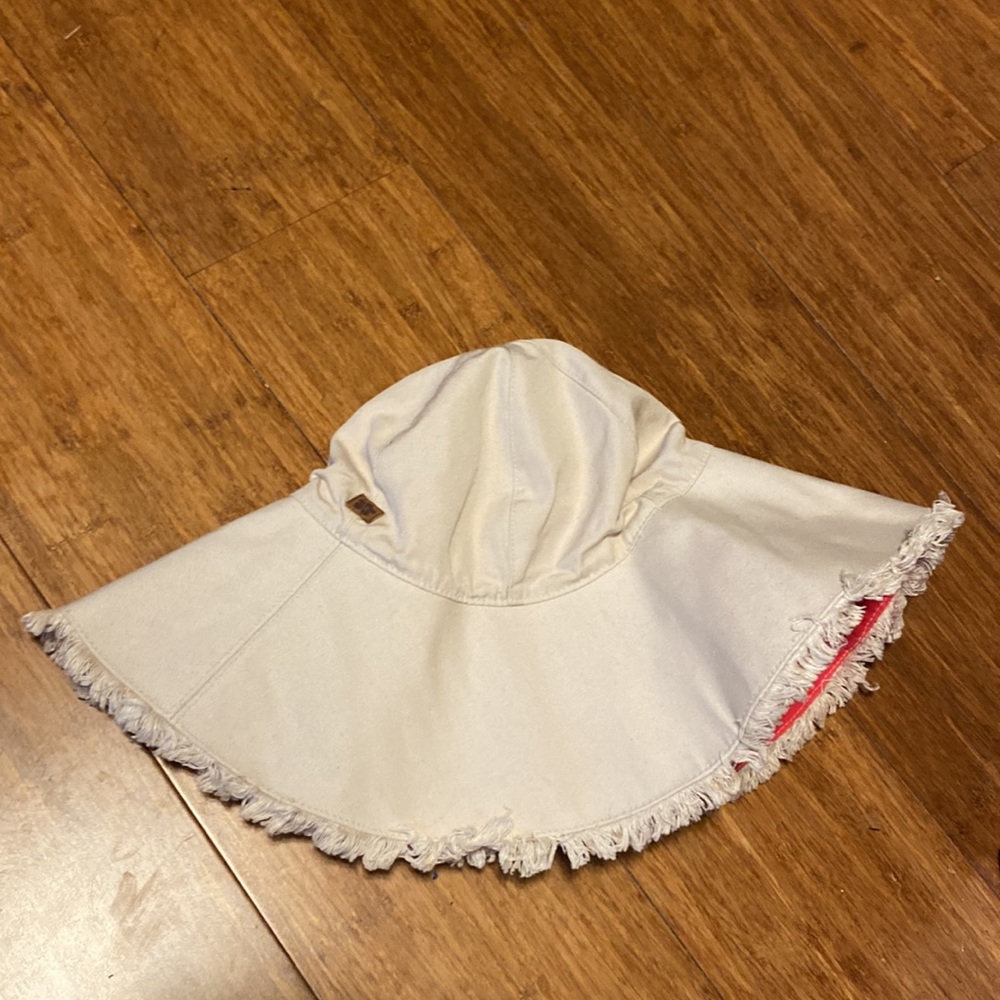 Tan and red reversible bucket hat